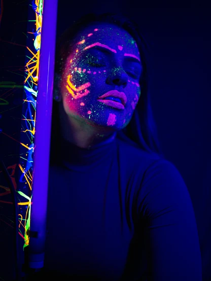a woman with fluorescent paint on her face, a portrait, by Julia Pishtar, pexels contest winner, holography, black light velvet poster, profile image, lightshow, !!! colored photography