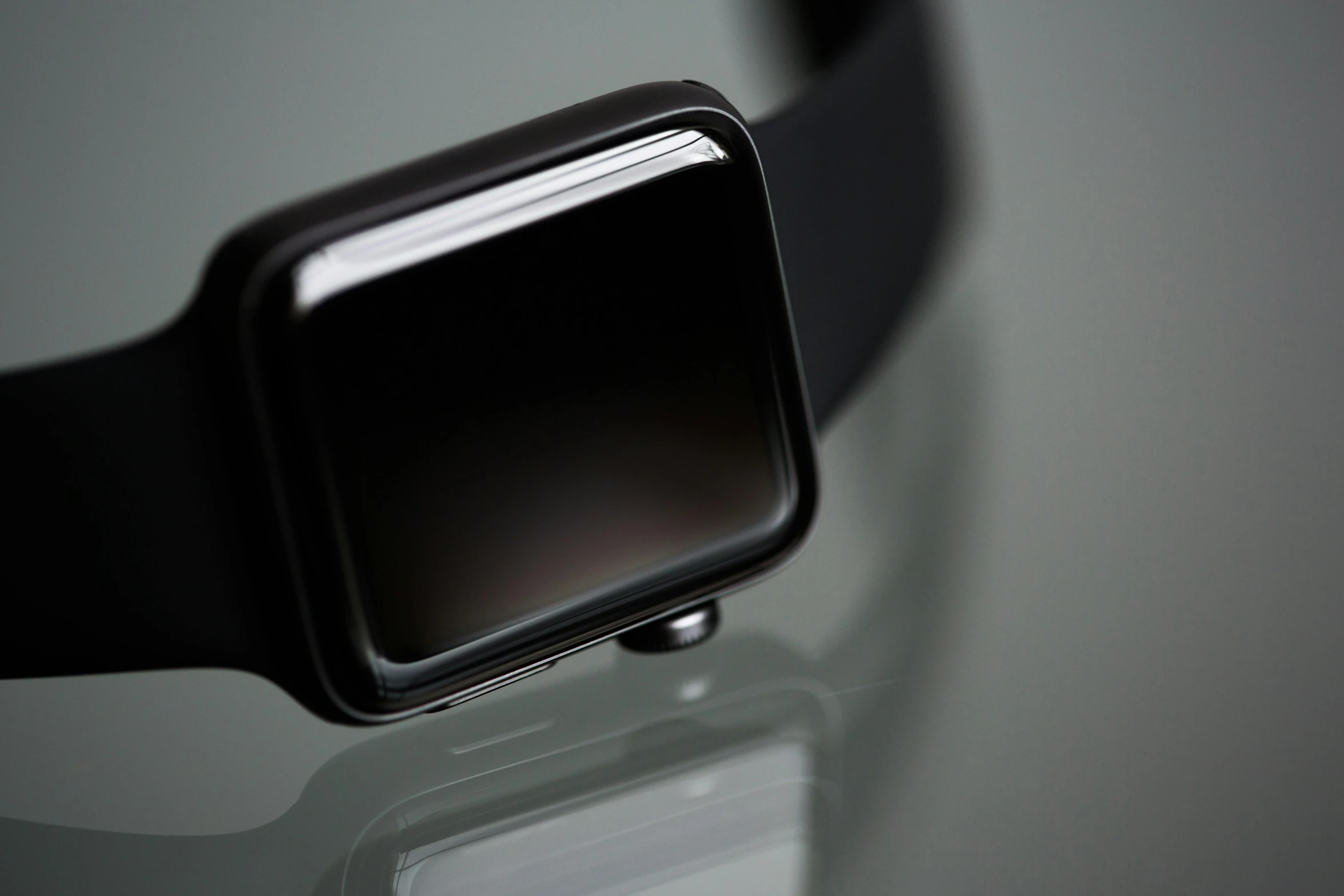 an apple watch sitting on top of a glass table, pexels, minimalism, black lacquer, square, shot on sony a 7, monochrome 3 d model