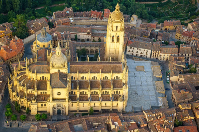 an aerial view of a city with lots of buildings, by Luis Paret y Alcazar, pexels contest winner, baroque, estefania villegas burgos, square, cathedral in the background, natural morning light