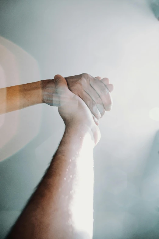 a close up of a person holding a baseball bat, inspired by Elsa Bleda, holding each other hands, under a shower, in meeting together, translucent