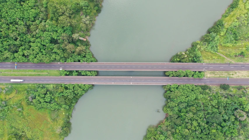 an aerial view of a bridge over a river, by Daniel Lieske, hurufiyya, accurate roads, thomas kinkad, thumbnail, teaser