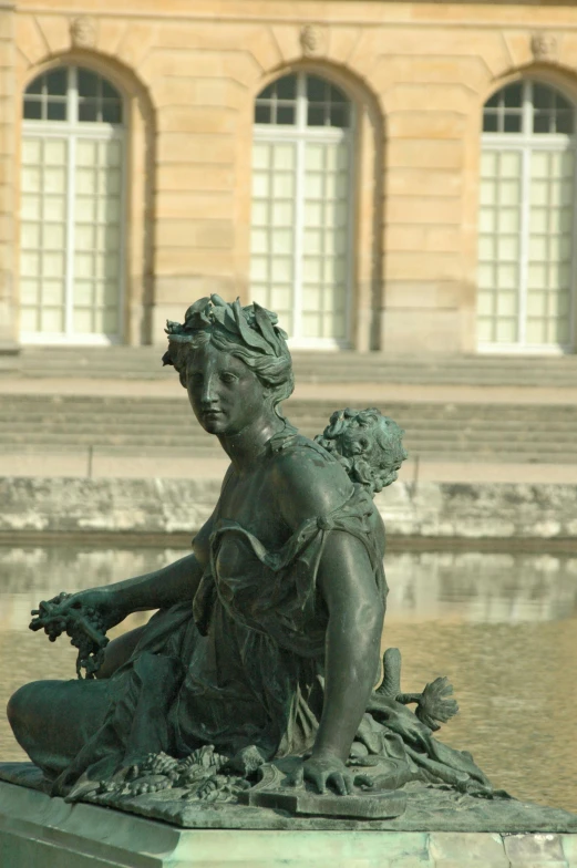 a statue of a woman sitting on top of a fountain, a statue, inspired by François Joseph Heim, royal palace near the lake, medium head to shoulder shot, brass semi - mechanical woman, seen from outside