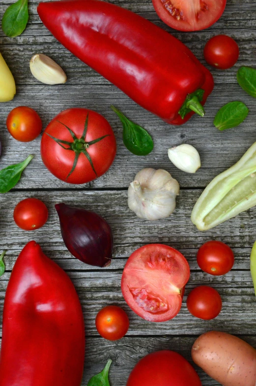 a table topped with lots of different types of vegetables, a picture, pexels, primary colors, promo image, tomato sauce, gray