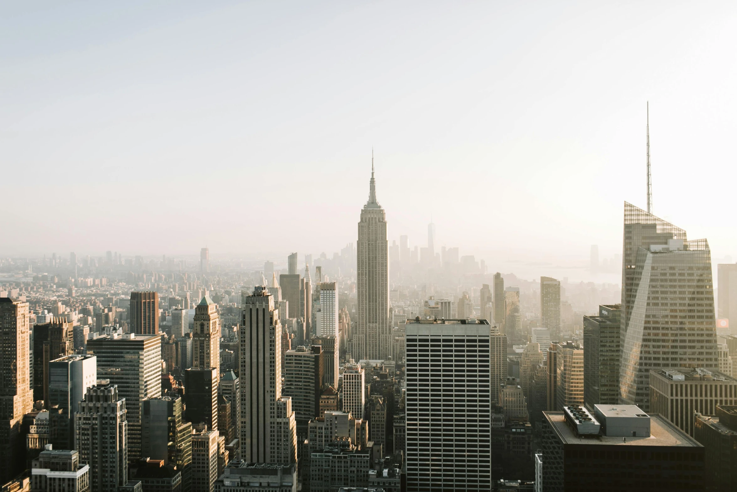 a view of a city from the top of a building, pexels contest winner, new york backdrop, morning haze, 4k press image, instagram post