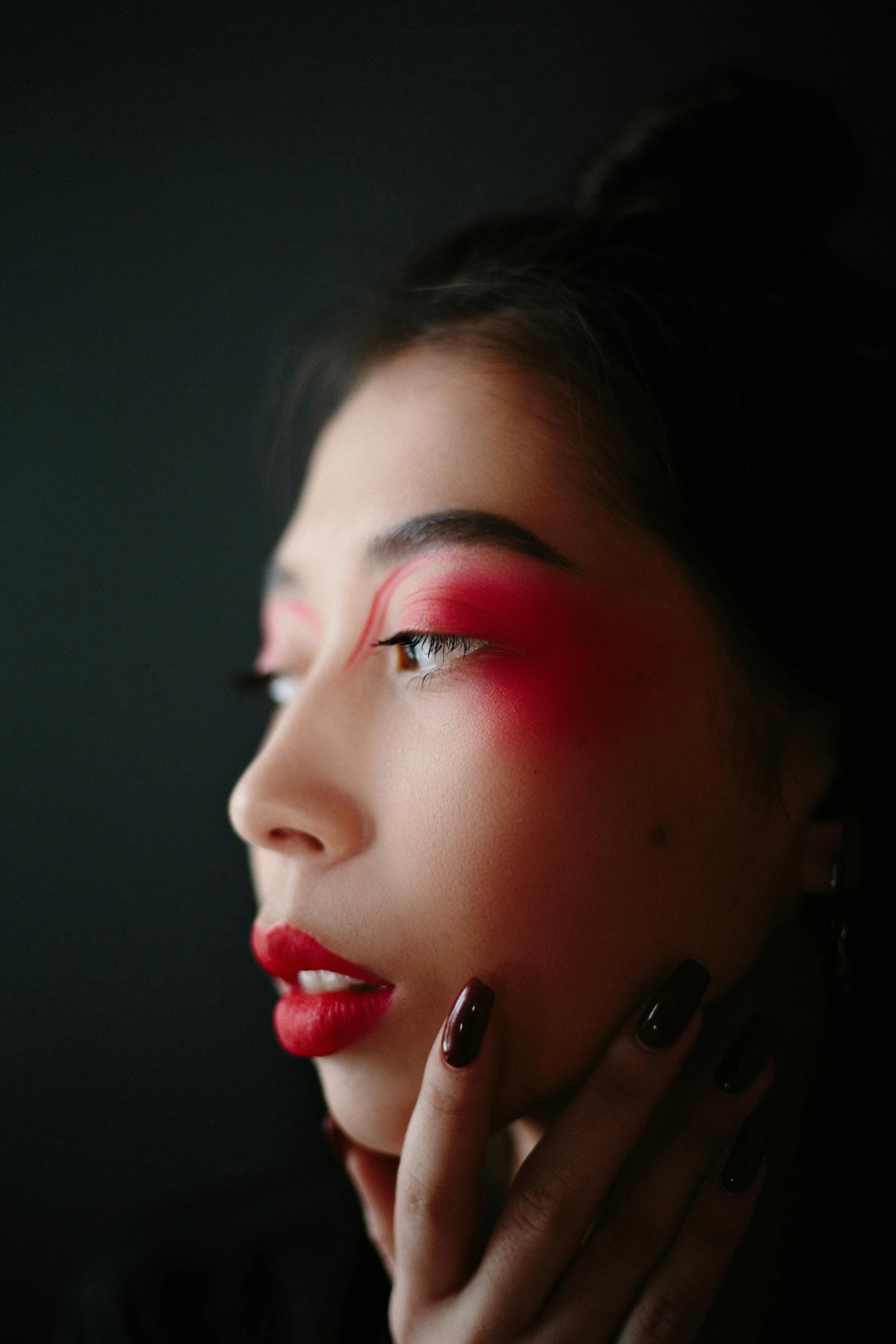 a woman with bright makeup and red lipstick, inspired by Taro Yamamoto, trending on pexels, young asian girl, subtle shadows, red mist, asian human