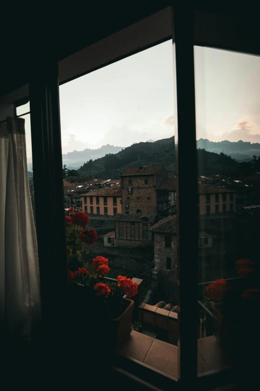 a view of a city from a window, a picture, unsplash contest winner, renaissance, distant town in valley and hills, dimly lit bedroom, flowers, tourist photo