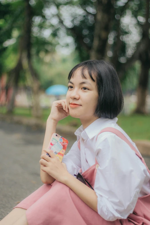 a woman in a pink dress sitting on the ground, by Tan Ting-pho, pexels contest winner, realism, with a bob cut, ulzzang, headshot profile picture, smol