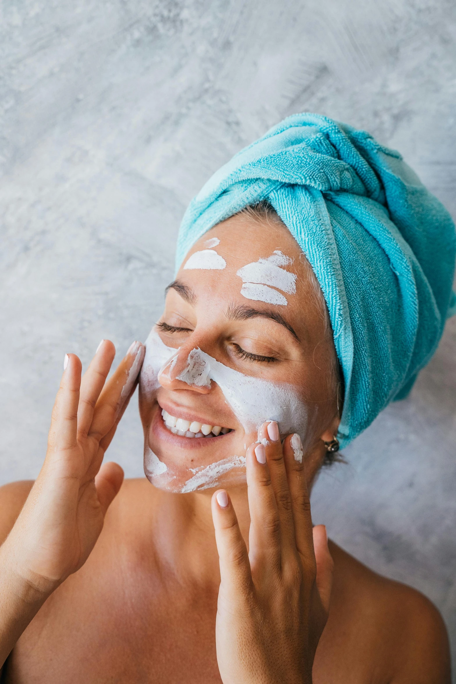 a woman with a towel on her head shaving her face, a portrait, trending on pexels, renaissance, smiling mask, square, synthetic bio skin, cheery