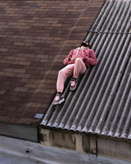 a person laying on the roof of a building, trending on pexels, wearing a light - pink suit, corduroy, streetwear, lgbtq