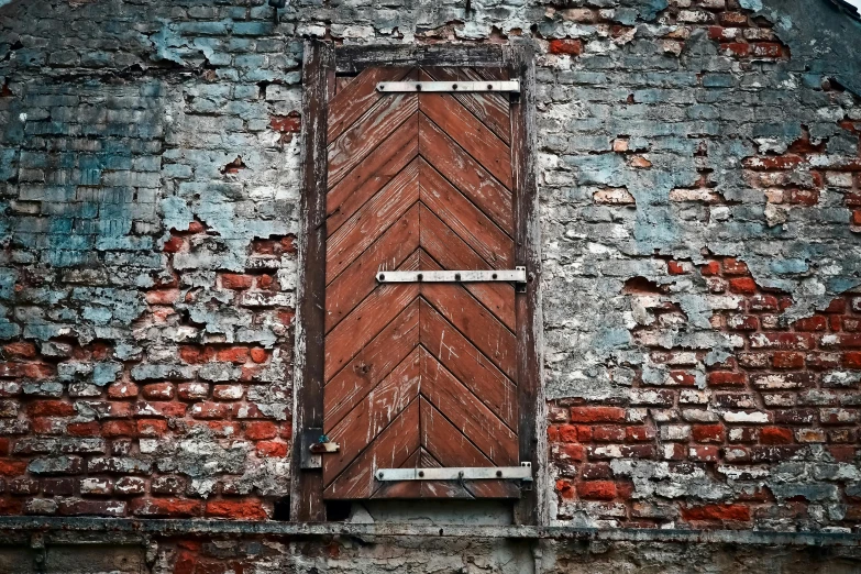 an old brick building with a wooden door, a photo, pixabay, metal shutter, art print, abstract photography, 3 4 5 3 1