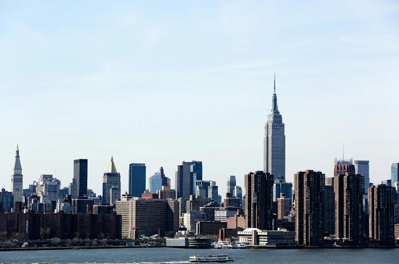 a large body of water with a city in the background, a photo, unsplash, hudson river school, 15081959 21121991 01012000 4k, bjarke ingels, slide show, 2000s photo