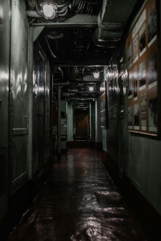 a long hallway with a clock on the wall, inspired by Elsa Bleda, unsplash, in a nuclear submarine, scp-049, high quality photo, horror image