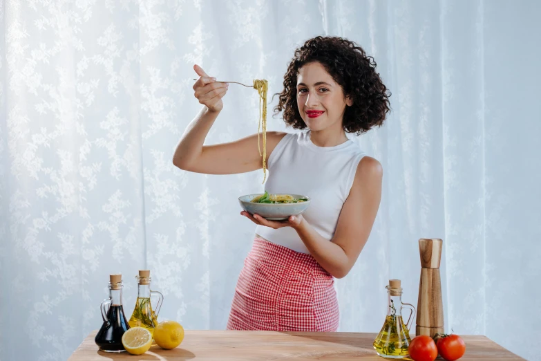 a woman in a white top holding a bowl of food, olive oil, avatar image