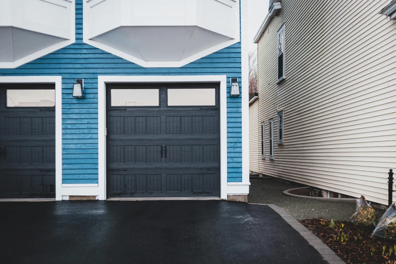 a couple of garage doors sitting on the side of a house, a portrait, unsplash, gradient blue black, new england architecture, wide high angle view, detailed product image