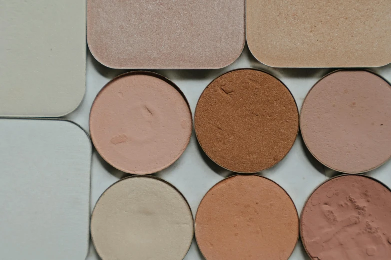 a close up of a palette of makeup, by Matija Jama, trending on pexels, bauhaus, clay material, beige, different sizes, round corners