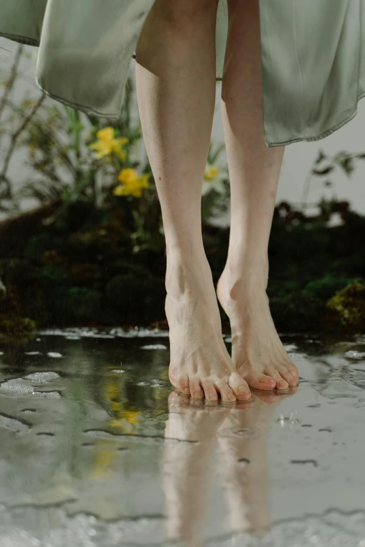 a woman standing on top of a puddle of water, unsplash, renaissance, exposed toes, cottagecore, extremely pale, myth of narcissus