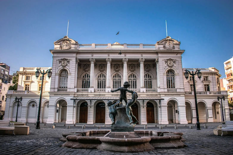 a large building with a fountain in front of it, by Alejandro Obregón, pexels contest winner, neoclassicism, khedival opera house, patagonian, aruba, square