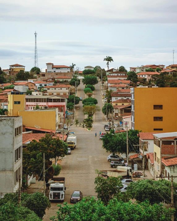 a view of a city from the top of a hill, by Matteo Pérez, happening, standing in township street, múseca illil, flatlay, obunga