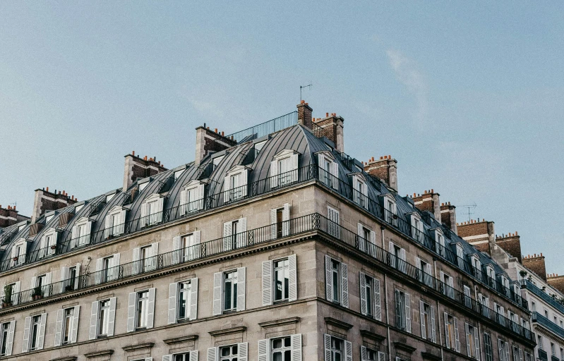 a very tall building with lots of windows, pexels contest winner, paris school, gambrel roof, regency-era, city apartment cozy calm, high resolution