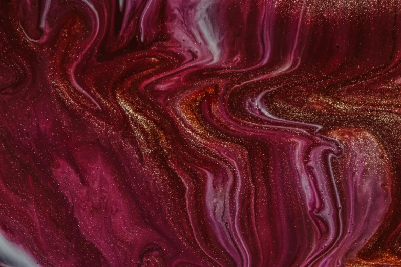 a close up of a plate of food on a table, a painting, trending on pexels, abstract expressionism, made of liquid purple metal, red swirls, pearlescent, maroon