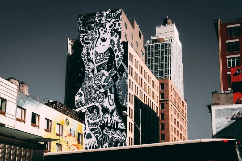 a bus parked in front of a tall building, graffiti art, inspired by Cleon Peterson, unsplash contest winner, street art, kaiju towering above new york, billboard image, phlegm, view from side