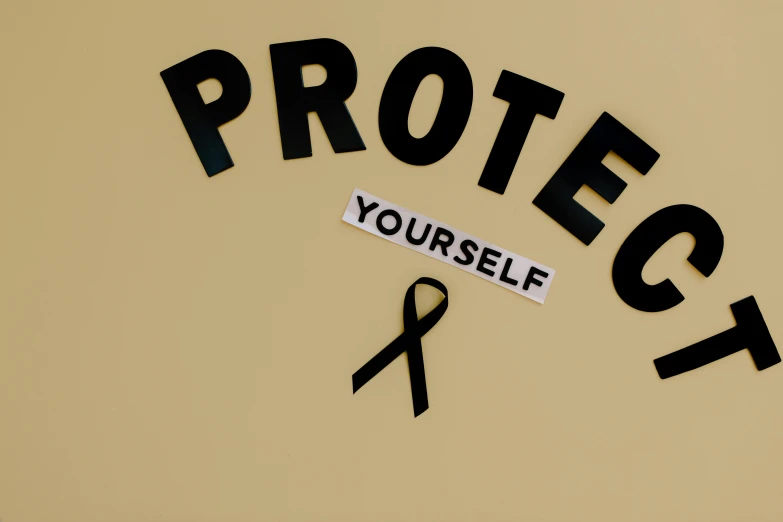 a clock with the words protect yourself written on it, an album cover, black bandage on arms, ribbon, getty images, 15081959 21121991 01012000 4k