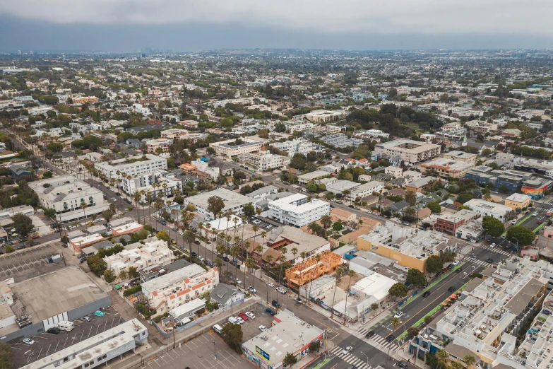 an aerial view of a city with lots of buildings, by Ryan Pancoast, unsplash, photorealism, 1600 south azusa avenue, taken in the early 2020s, slight overcast, future miramar