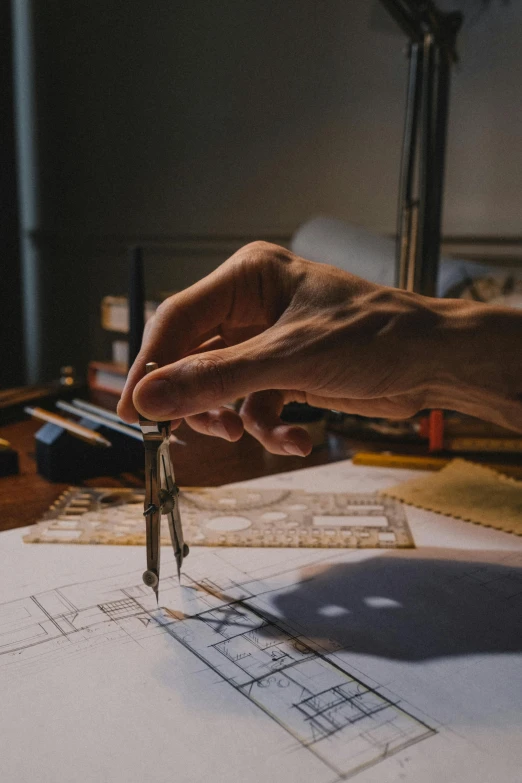 a person is drawing on a piece of paper, a detailed drawing, by Mathias Kollros, pexels contest winner, arts and crafts movement, architectural model, gunsmithing, inspect in inventory image, tabletop model