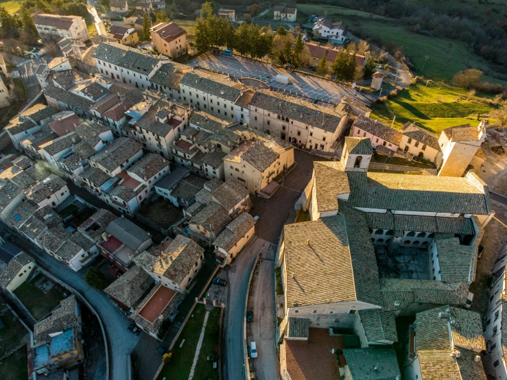 a bird's eye view of a small town, a portrait, by Francesco Furini, pexels contest winner, renaissance, sun light, square, panoramic, worn