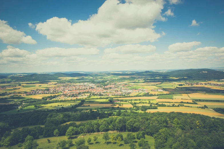 a view of the countryside from the top of a hill, pexels contest winner, renaissance, square, detmold, plain background, retro stylised