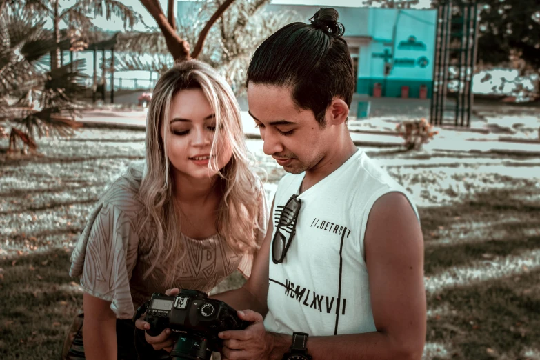 a man and a woman looking at a camera, pexels contest winner, pokimane, guide, ariel perez, avatar image