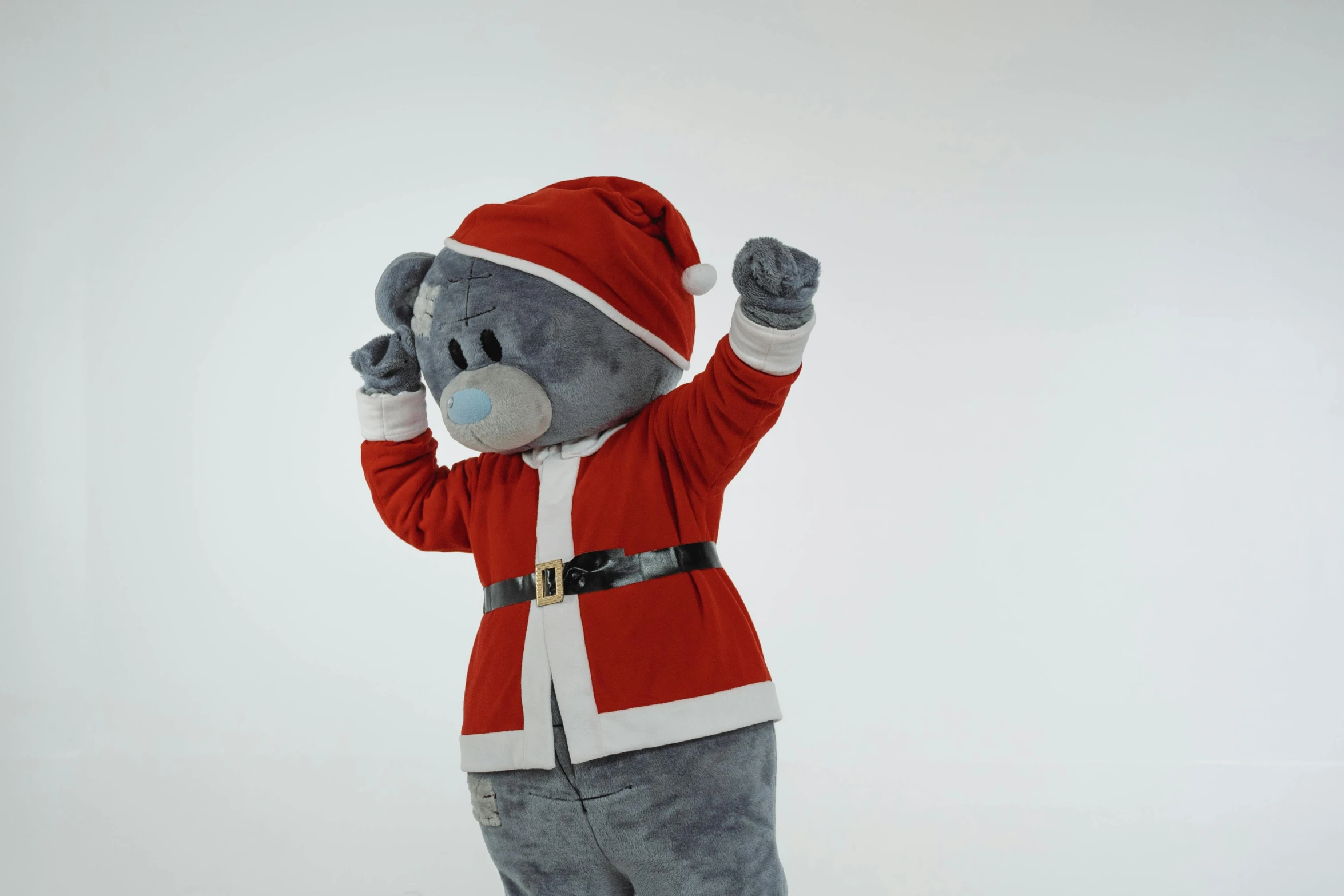 a teddy bear dressed in a santa suit, a picture, pexels, furry art, gray anthropomorphic, animation character, softplay, bluey