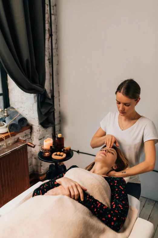 a woman getting a facial massage at a spa, by Niko Henrichon, trending on unsplash, renaissance, thumbnail, low quality photo, hammershøi, studio photo