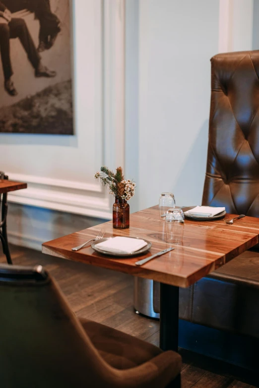 a brown leather chair sitting next to a wooden table, renaissance, gourmet restaurant, jen atkin, square, healthy