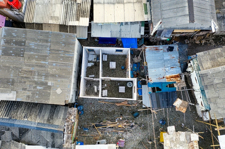 a group of buildings that are next to each other, makeshift house, birdseye view, jia ruan, 2 0 2 2 photo