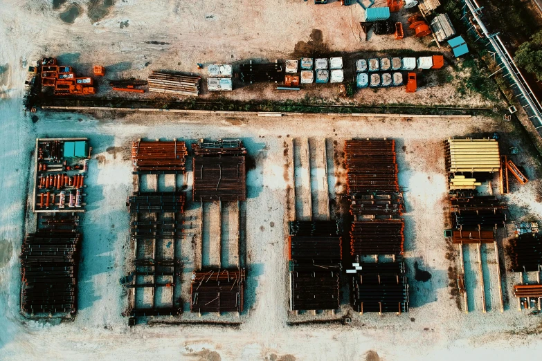 a bird's eye view of a train yard, unsplash, renaissance, mud and rusty pipes, high quality product image”, crates and parts on the ground, worksafe. instagram photo