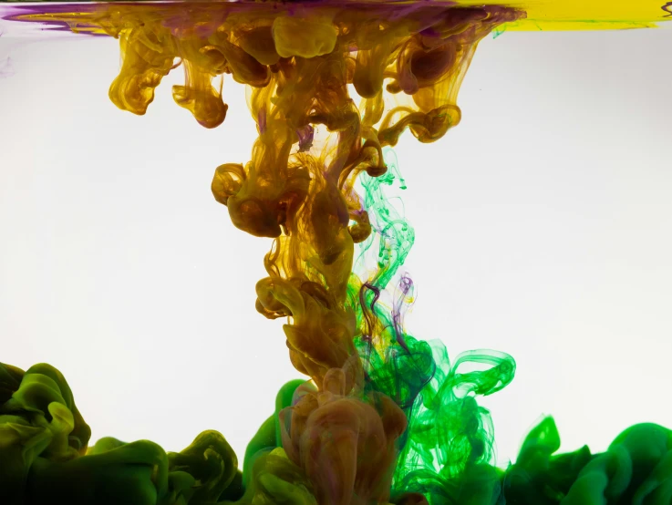 a yellow and green liquid is in the water, inspired by Kim Keever, unsplash, process art, psychedelic colouring, purple liquid, honey dripping from ceiling, pikachu on acid