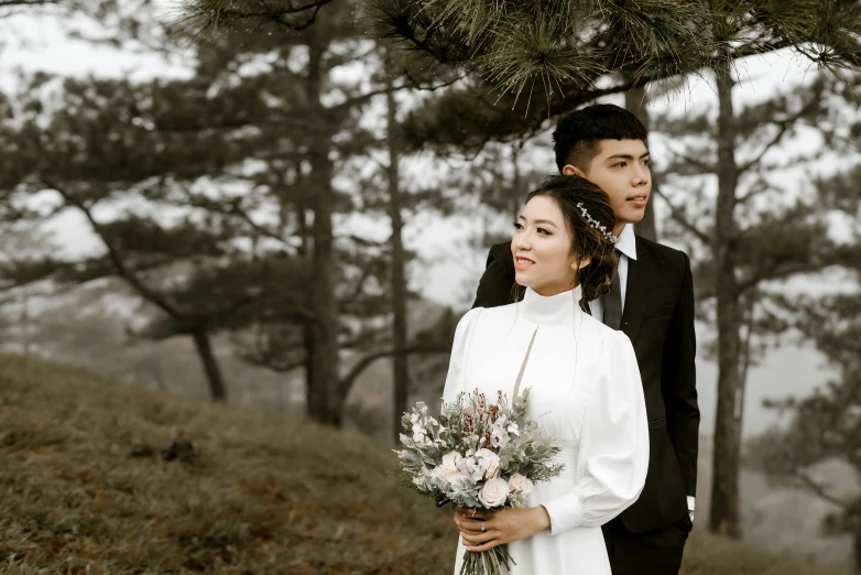 a man and a woman standing next to each other, a colorized photo, inspired by Ruth Jên, pexels contest winner, romanticism, ao dai, white, portrait shot 8 k, rectangle