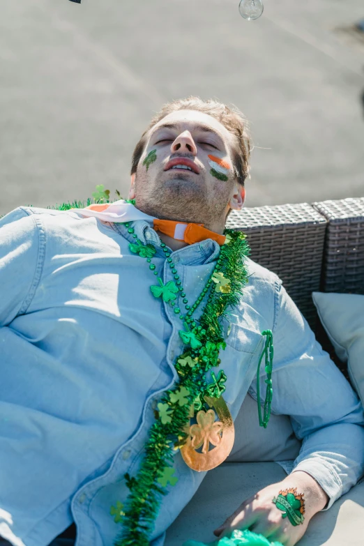 a man that is laying down on a couch, inspired by Hallsteinn Sigurðsson, trending on reddit, celtics, having fun in the sun, he has a devastated expression, charlie day