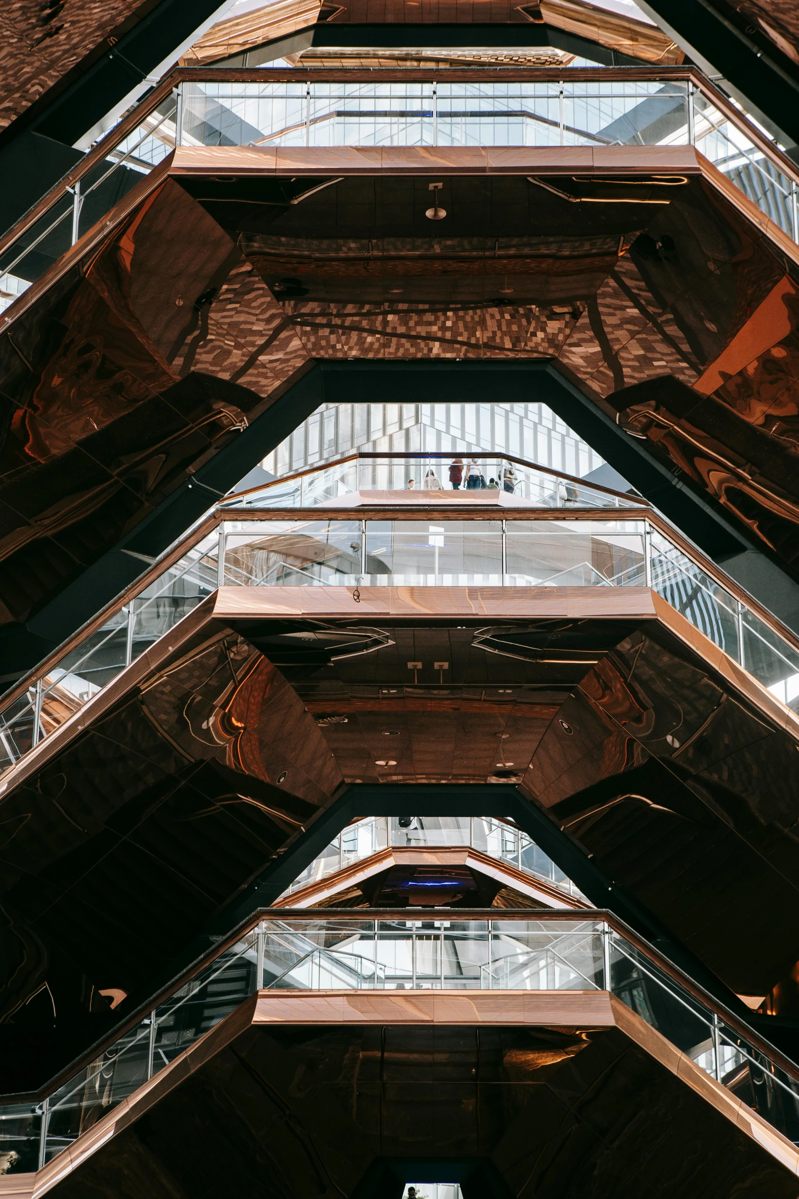 a group of people walking down an escalator, inspired by Zaha Hadid, trending on unsplash, modernism, peaked wooden roofs, intricate copper details, interior of a star destroyer, view from ground level