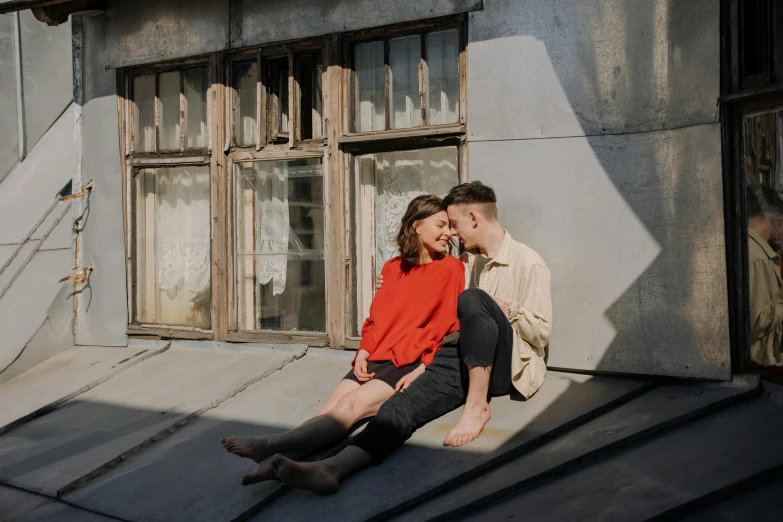 a man and woman sitting on the roof of a building, pexels contest winner, non binary model, secret romance, on the concrete ground, 15081959 21121991 01012000 4k