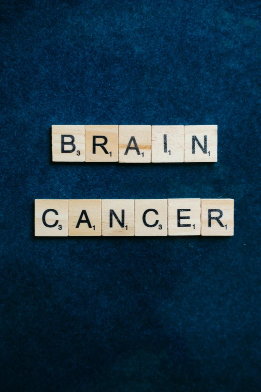 the word brain cancer spelled with scrabbles on a blue background, an album cover, on a gray background, ..', thumbnail, 0