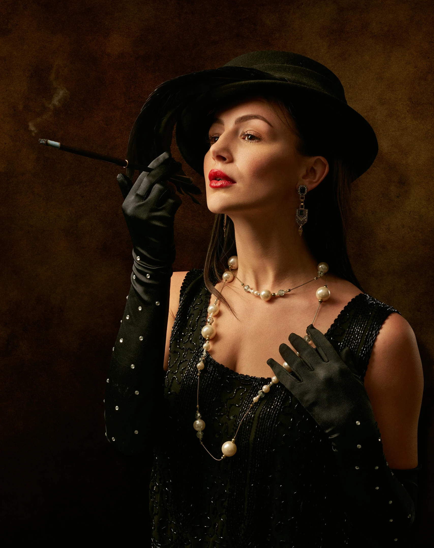 a woman in a black dress and hat smoking a cigarette, inspired by Evaline Ness, trending on pexels, art nouveau, pearl necklace, pearl earring, trending on 500px, wearing gloves