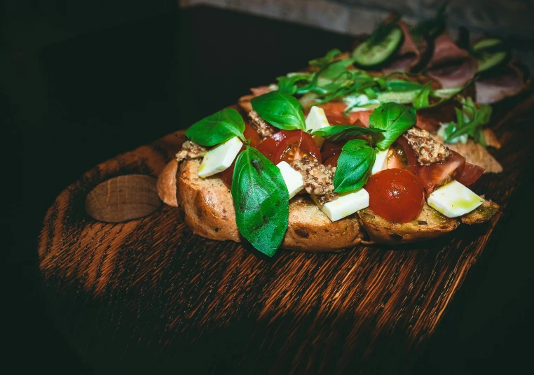 a sandwich sitting on top of a wooden cutting board, a portrait, by Julia Pishtar, unsplash, renaissance, basil, summer night, 15081959 21121991 01012000 4k, high quality picture