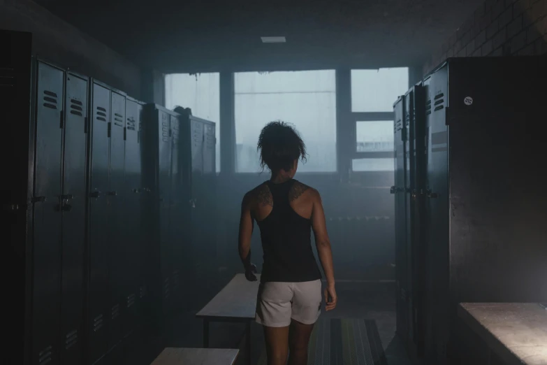 a woman standing in a hallway next to lockers, inspired by Gregory Crewdson, unsplash contest winner, octane render. fog, in a gym, ashteroth, ignant