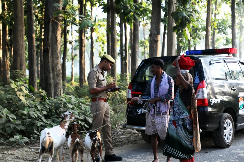 a couple of people that are standing next to a car, pexels, bengal school of art, political meeting in the woods, with stray dogs, police officers, thumbnail