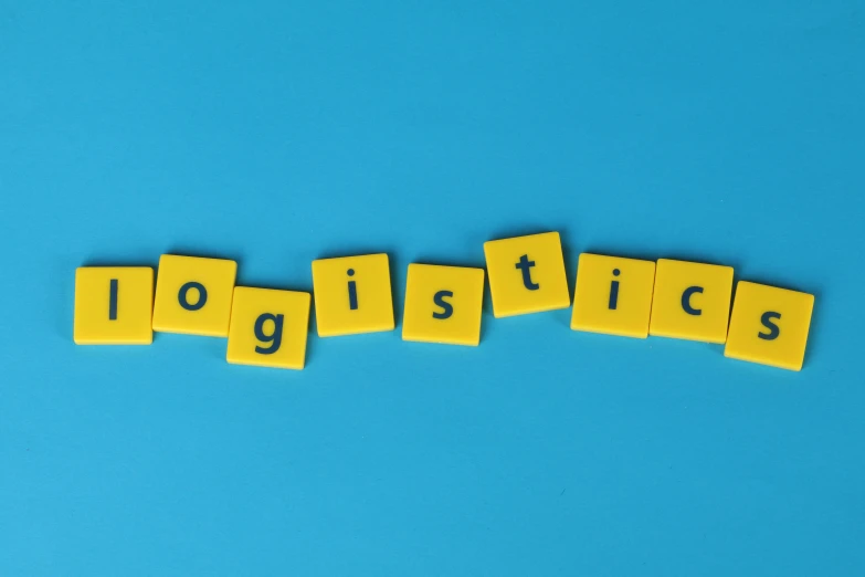 the word logistics spelled in scrabbles on a blue background, a picture, by Nicolette Macnamara, yellow, delightful, smooth feature, set against a white background