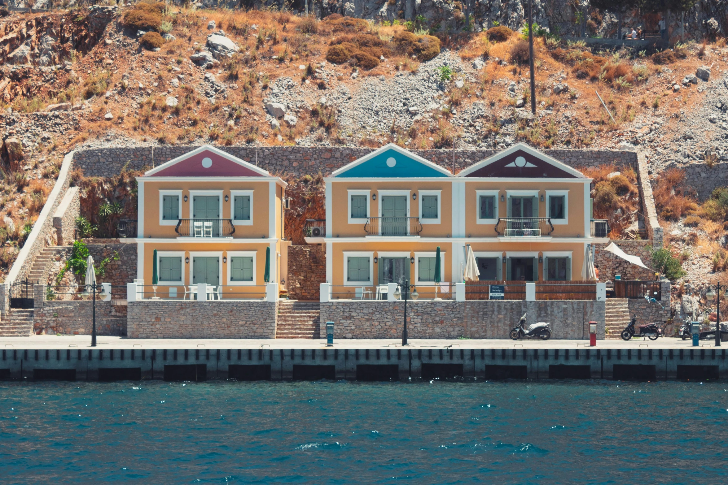 a couple of houses sitting on top of a body of water, a colorized photo, pexels contest winner, turkey, docks, avatar image, three colors