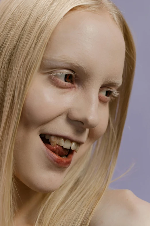 a close up of a person holding a cell phone, an album cover, inspired by Ignacy Witkiewicz, reddit, hyperrealism, anya taylor - joy vampire queen, white prosthetic eyes, humanoid with crooked teeth, showstudio