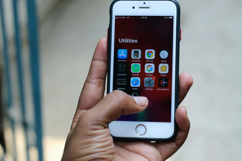 a close up of a person holding a cell phone, by Robbie Trevino, happening, square, file photo, utility, with apple